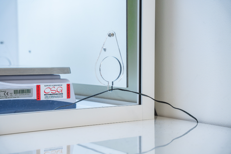 Cable running through an outlet on the side of Airone C700