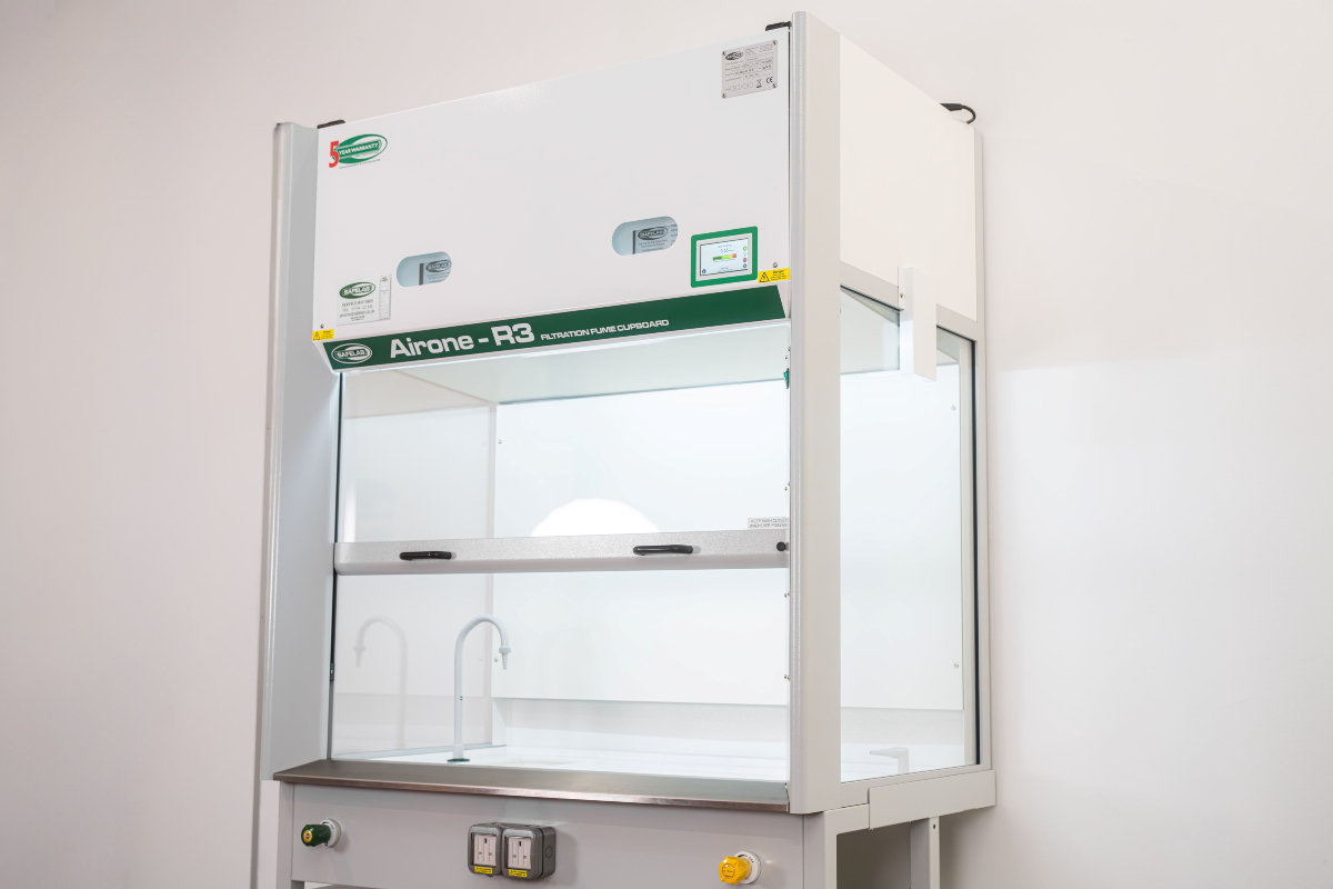Fume cupboard installation in UK laboratory showing completed system ready for commissioning and use