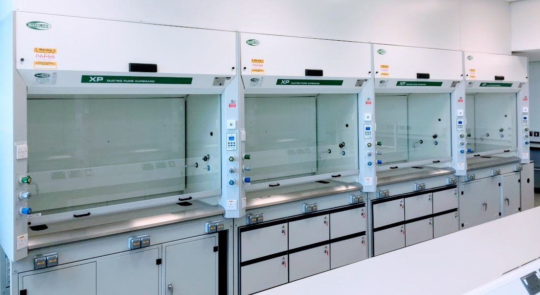 Ducted fume cupboards installed in UK laboratory showing modern laboratory environment