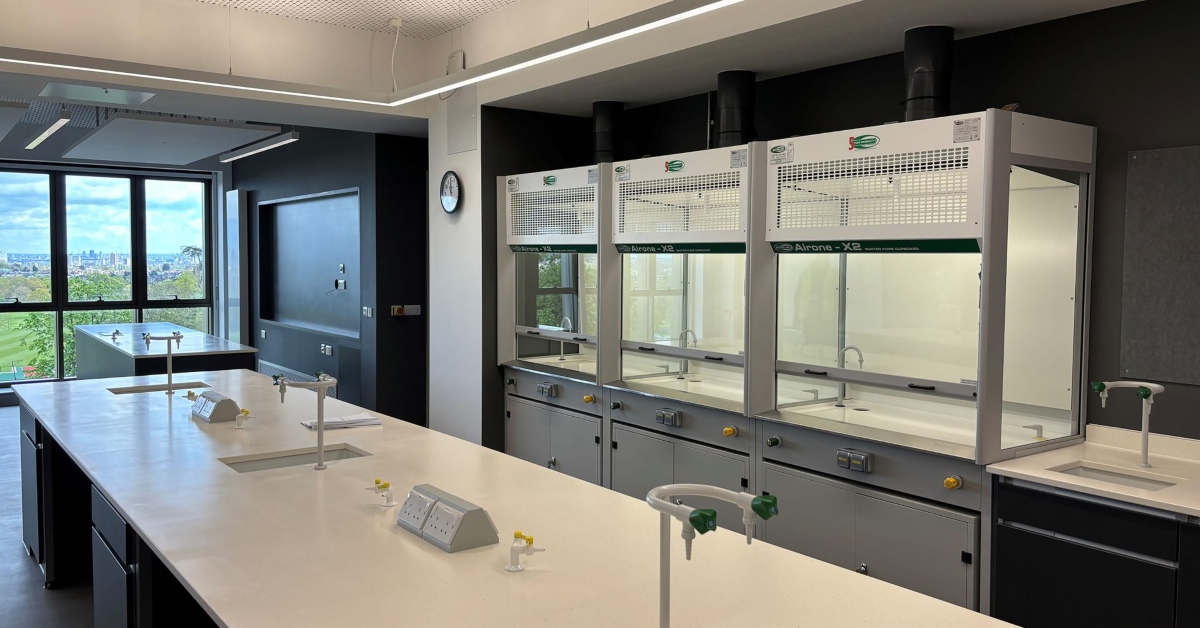 Harrow School science laboratory with workstation and fume cupboards
